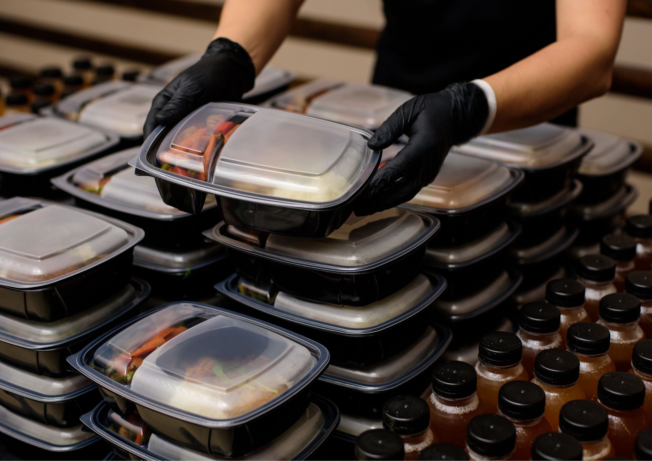 Efficient food packaging with healthy meal prep containers for office deliveries.