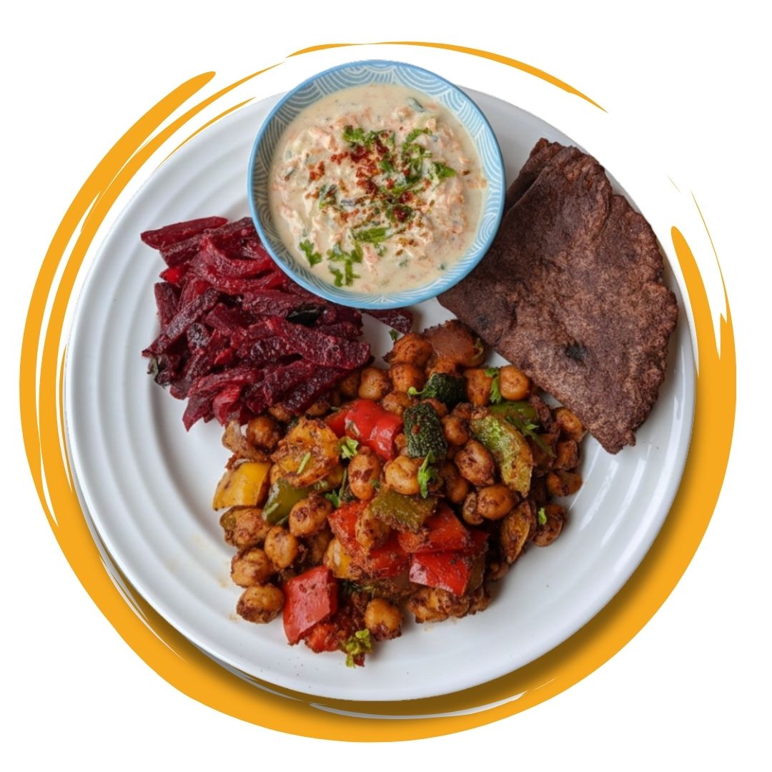 Balanced plated meal with protein, vegetables, and sides, ideal for a Meals subscription in Kolkata.