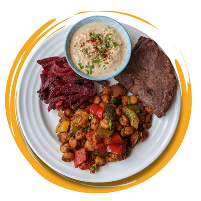Balanced plated meal with protein, vegetables, and sides, ideal for a Meals subscription in Kolkata.