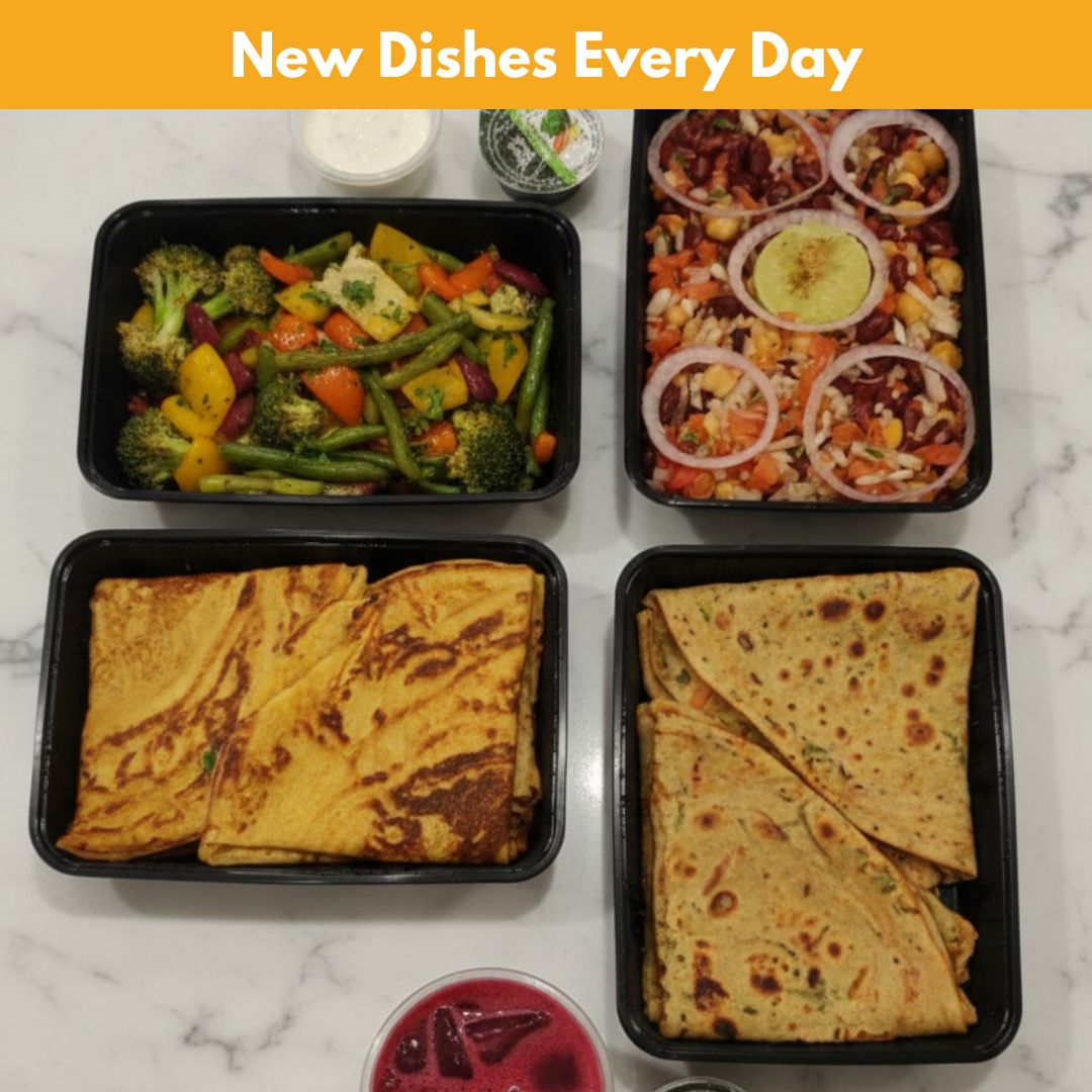 Daily meal boxes with fresh vegetables, roti's, and varied dishes, highlighting a nutritious Meals subscription in Kolkata with new dishes every day.