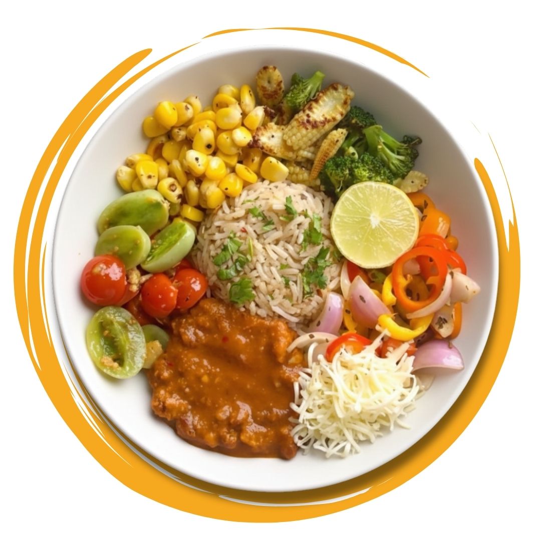 Balanced Indian meal bowl with rice, curry, and vegetables, offering Healthy Meals in Kolkata.