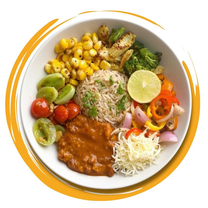 Balanced Indian meal bowl with rice, curry, and vegetables, offering Healthy Meals in Kolkata.